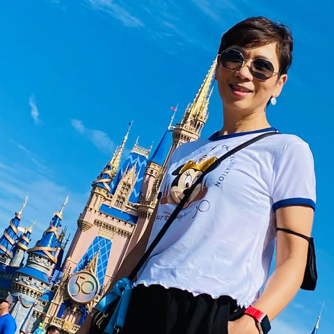 Hui-Fen smiling during a joyful day out